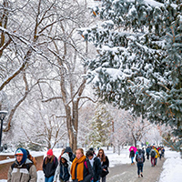 students walking on campus during winter